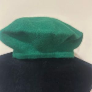 Pretty green  wool hat in new condition.  Never worn.